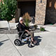 Jane-using-wheelchair-outside